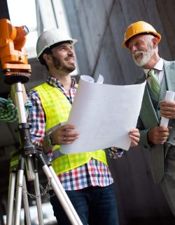 engineer-foreman-and-worker-discussing-in-buildin-2025-03-15-20-47-21-utc.jpg